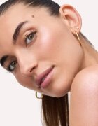 Catrice Diamond Haze Jelly твърд крем хайлайтър в стик цвят 010 Born To Sparkle 7.5 гр.