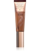 Charlotte Tilbury Beautiful Skin Foundation хидратиращ фон дьо тен цвят 13 Warm 30 мл.