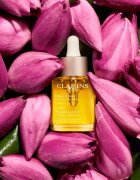 Clarins Lotus Treatment Oil регенериращо масло с изглаждащ ефект дневен и нощен 30 мл.