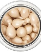 Clarins Milky Boost Capsules озаряващ фон дьо тен капсули цвят 01 30x0.2 мл.
