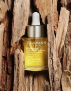 Clarins Santal Face Treatment Oil успокояващо и регенериращо масло за суха кожа 30 мл.