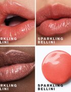 Estée Lauder Pure Color Melt-On Shimmer Stick блясък за устни с блестящи частици цвят Sparkling Bellini 1.8 гр.