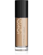 JOKO Luminous Touch лек фон дьо тен за равномерен тен на кожата цвят 104 Warm Honey 30 мл.