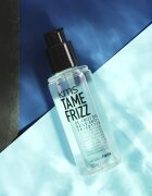 KMS Tame Frizz De-Frizz Oil защитно масло против чупливост на косата за къдрава коса 100 мл.