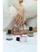 KUNDAL Objet Satin Glow Body Oil подхранващо масло за тяло за интензивна хидратация с аромат Santal Rose 100 мл.