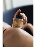 KUNDAL Objet Satin Glow Shimmer Oil блестящо масло с хидратиращ ефект цвят Fabulous Gold 45 мл.