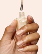 LONDONTOWN Kur Tinted Fortifying Ridge Filler изглаждаща основа-лак за нокти за сухи и крехки нокти цвят Apricot Beige 12 мл.