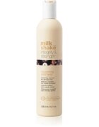 milk_shake® Integrity & Strength Nourishing Shampoo подхранващ шампоан за увредена коса 300 мл.