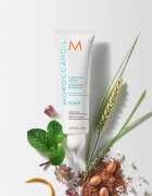 Moroccanoil Scalp Purifying Scrub нежно почистващ пилинг с успокояващ ефект за кожата на скалпа 125 мл.
