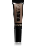 Nudestix Tinted Cover лек фон дьо тен с озаряващ ефект за естествен вид цвят Nude 10 25 мл.