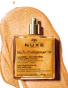 Nuxe Huile Prodigieuse Or мултифункционално масло със блестящи частици за лице тяло и коса 100 мл.