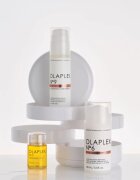 Olaplex N°6 Bond Smoother хидратиращ стилизиращ крем против цъфтене с дозатор 100 мл.