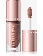 Revolution Y2k Sweet Bomb блясък за устни с блестящи частици цвят Strawberry Swirl Pink 4.5 мл.