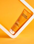 Super Facialist Vitamin C+ Brighten озаряващ пилинг за лице врат и деколкте 125 мл.