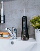 TrueLife AquaFloss Compact L100 Black душ за устна хигиена 1 бр.