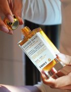 Truly Golden Glaze хидратиращо олио за тяло с озаряващ ефект 90 мл.