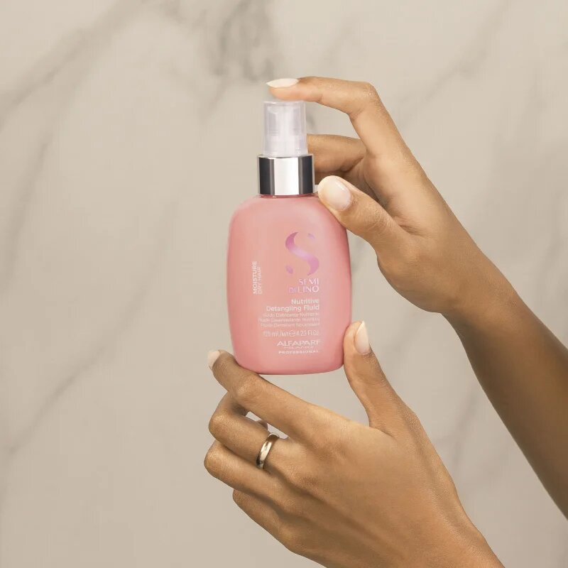 Alfaparf Milano Semi di Lino Moisture Nutritive Detangling Fluid хидратираща грижа без отмиване за по-лесно разресване на косата 125 мл.
