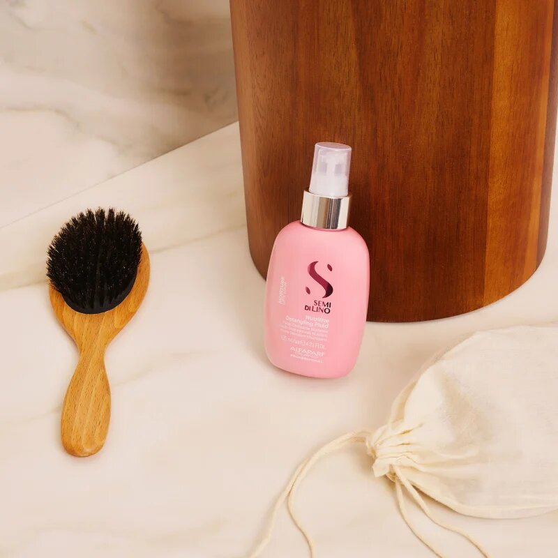 Alfaparf Milano Semi di Lino Moisture Nutritive Detangling Fluid хидратираща грижа без отмиване за по-лесно разресване на косата 125 мл.