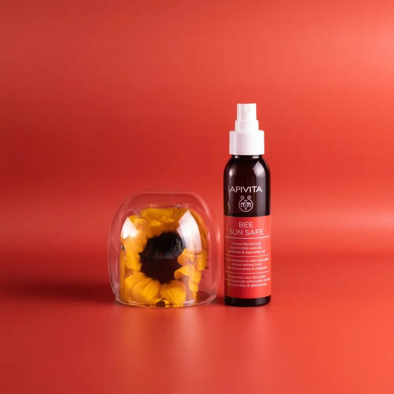 Apivita Bee Sun Safe Hair Oil хидратиращо олио за изтощена от слънце коса 100 мл.