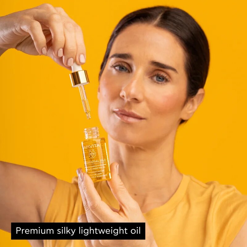 Apivita Beessential Oils Strengthening & Hydrating Day Oil озаряващо дневно олио за интензивна хидратация 15 мл.