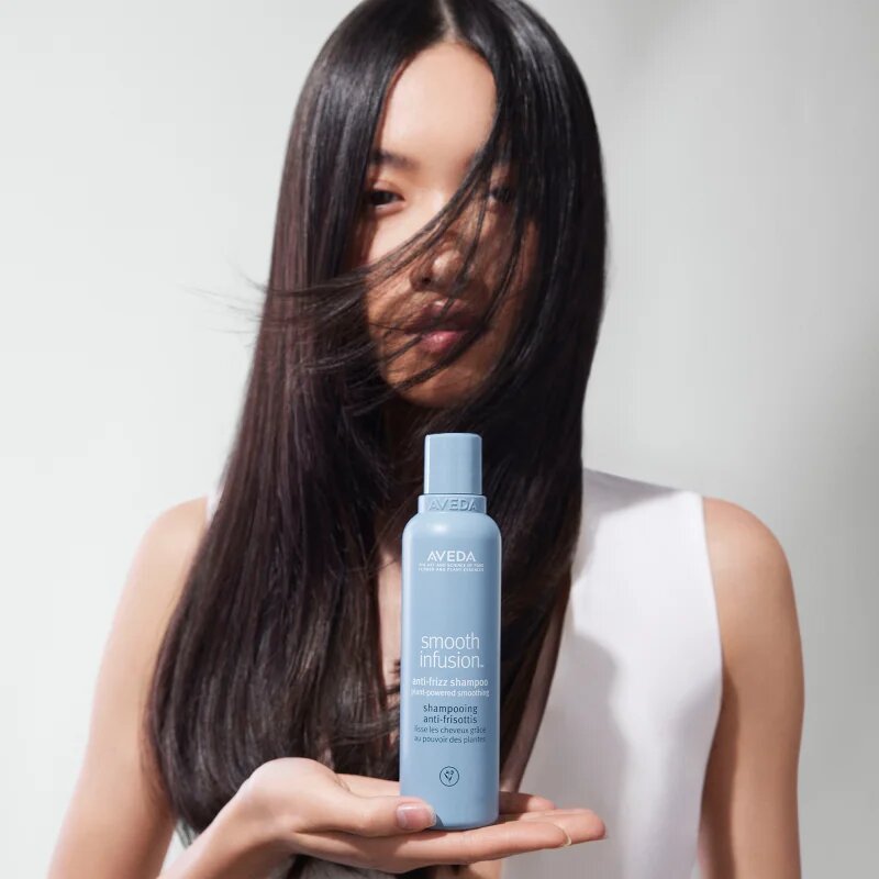 Aveda Smooth Infusion™ Anti-Frizz Shampoo изглаждащ шампоан против цъфтене 50 мл.