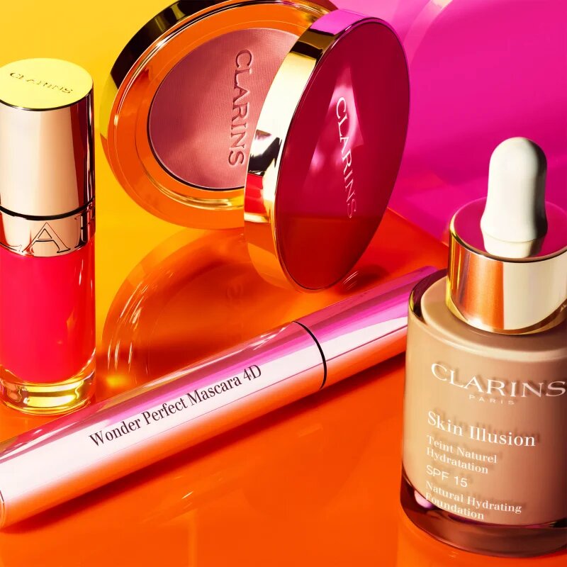 Clarins Lip Comfort Oil Limited Edition масло от нар с хидратиращ ефект цвят 22 daring orange 7 мл.