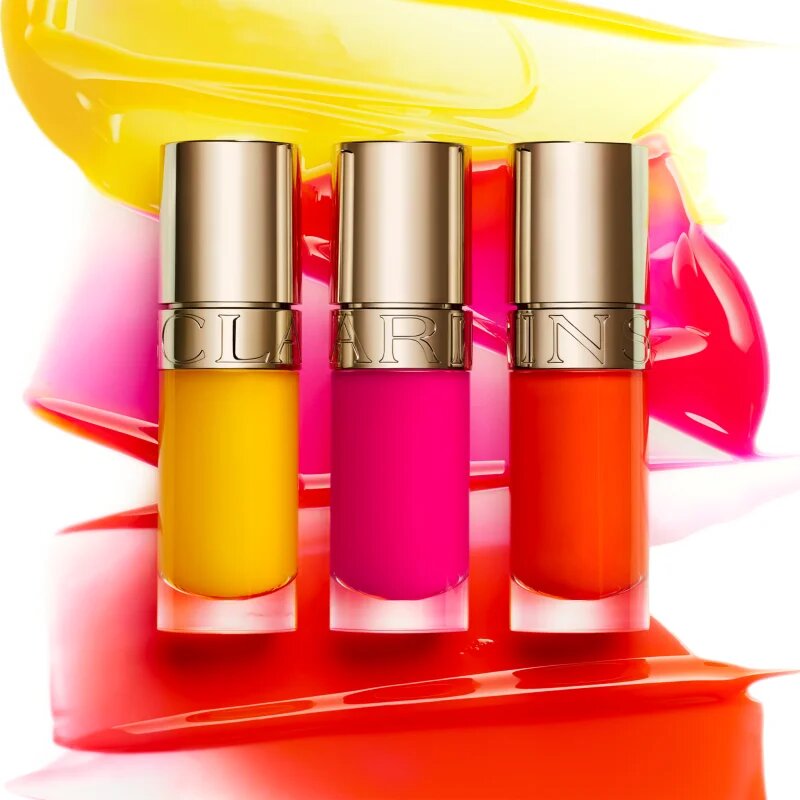 Clarins Lip Comfort Oil Limited Edition масло от нар с хидратиращ ефект цвят 22 daring orange 7 мл.