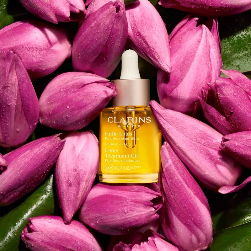 Clarins Lotus Treatment Oil регенериращо масло с изглаждащ ефект дневен и нощен 30 мл.
