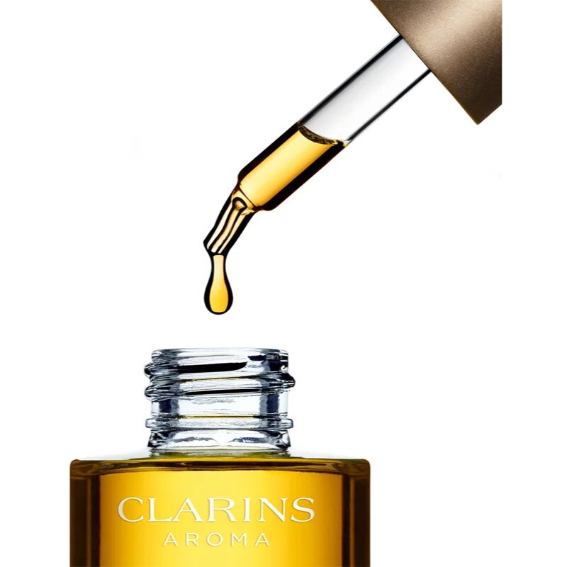 Clarins Lotus Treatment Oil регенериращо масло с изглаждащ ефект дневен и нощен 30 мл.