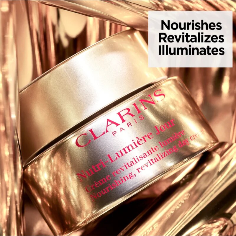 Clarins Nutri-Lumière Day ревитализиращ дневен крем за сияен вид на кожата 50 мл.