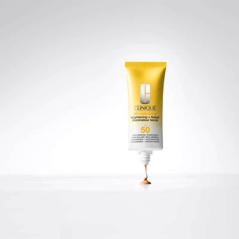 Clinique Sun UV Solutions Brightening Tinted Sunscream SPF50 озаряващ тониращ крем цвят Medium 40 мл.