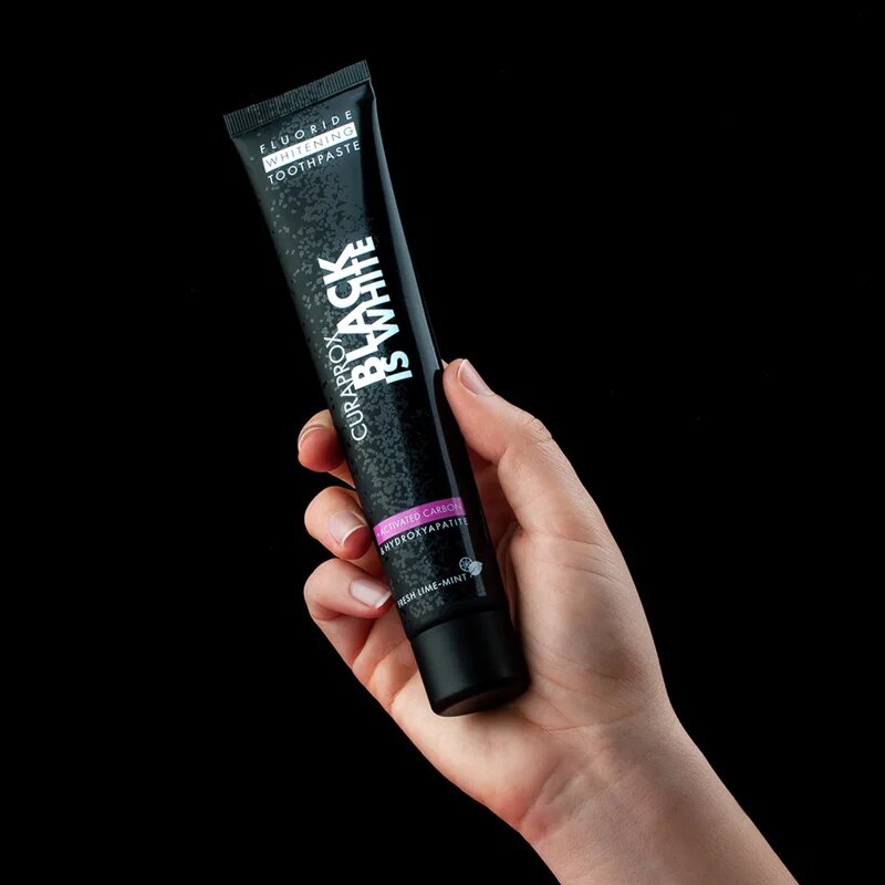 Curaprox Black is White избелваща паста с активен въглен с хидроксиапатит вкус Fresh Lime-Mint 90 мл.