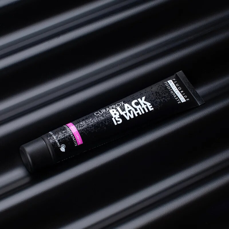 Curaprox Black is White избелваща паста с активен въглен с хидроксиапатит вкус Fresh Lime-Mint 90 мл.