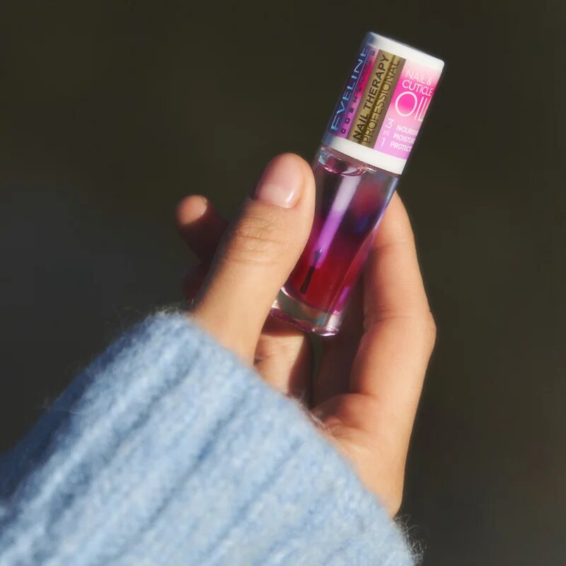 Eveline Cosmetics Nail & Cuticle Oil подхранващо масло за нокти 8 мл.