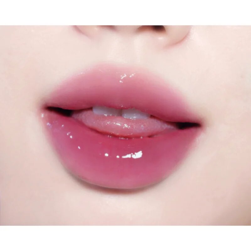fwee 3D Voluming Tint блясък за устни за увеличаване на обема цвят 11 Plum Dip 3.8 гр.