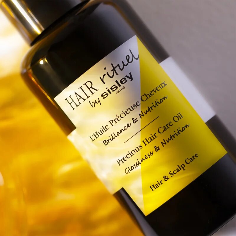Hair Rituel by Sisley Precious Hair Care Oil парфюмирано масло за коса за блясък и мекота на косата 100 мл.