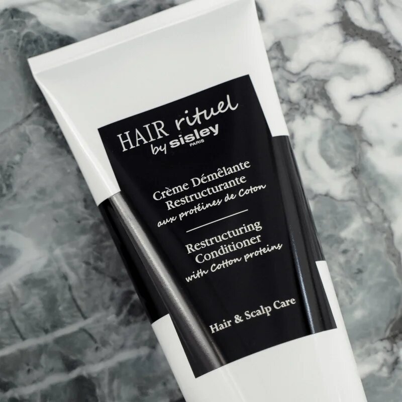Hair Rituel by Sisley Restructuring Conditioner with Cotton proteins изглаждащ балсам срещу късане на косата с протеини 200 мл.
