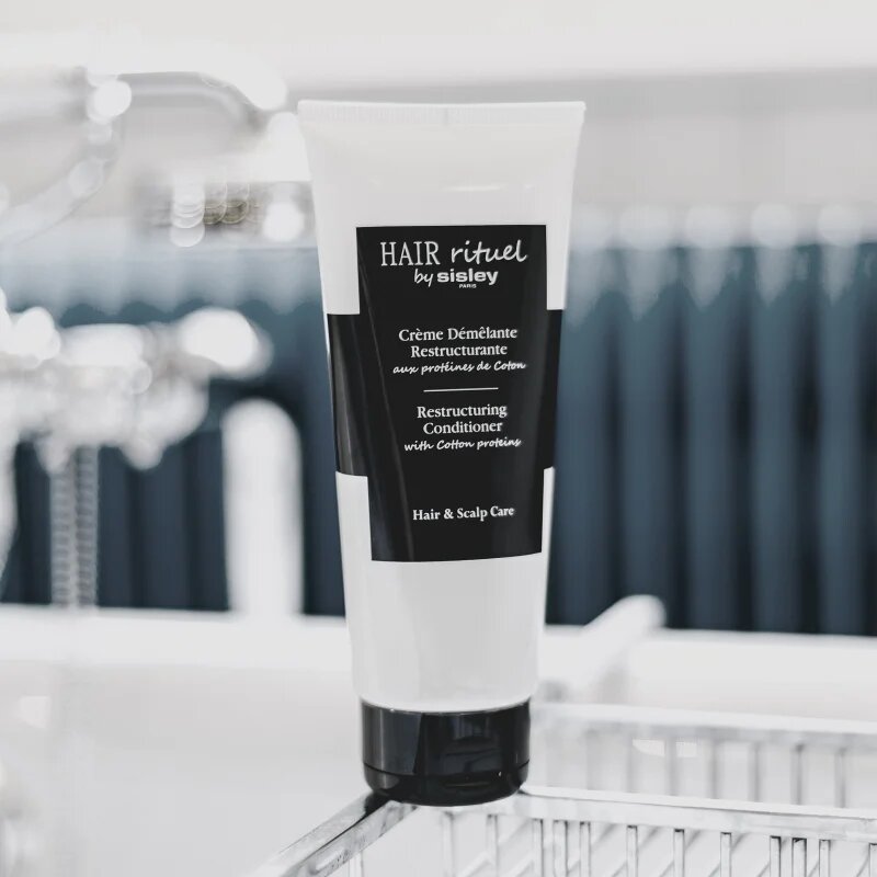 Hair Rituel by Sisley Restructuring Conditioner with Cotton proteins изглаждащ балсам срещу късане на косата с протеини 200 мл.