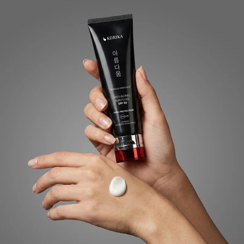 KORIKA Korean Heritage Ginseng & Marine Stem Cells Anti-aging Sun Fluid SPF 50 защитен флуид против стареене на кожата SPF 50 50 мл.