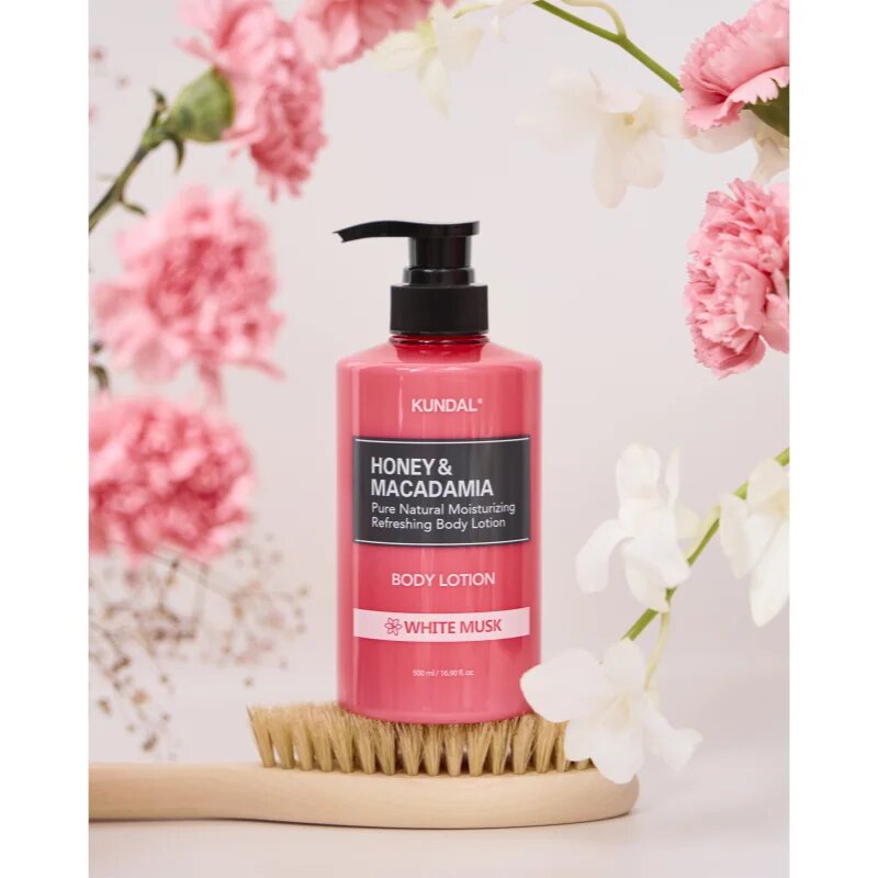 KUNDAL Honey & Macadamia White Musk подхранващ лосион за тяло с хидратиращ ефект 500 мл.