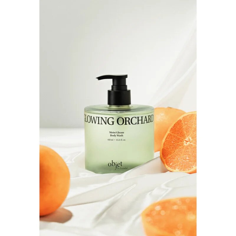 KUNDAL Objet Moist Gleam Body Wash парфюмиран душ гел за интензивна хидратация с аромат Glowing Orchard 450 мл.
