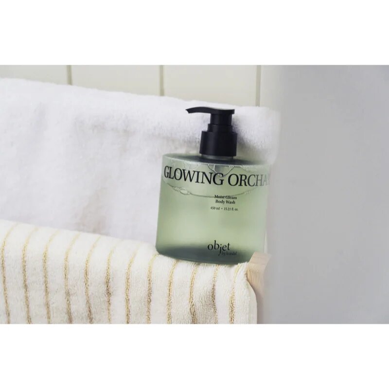 KUNDAL Objet Moist Gleam Body Wash парфюмиран душ гел за интензивна хидратация с аромат Glowing Orchard 450 мл.