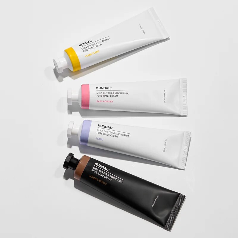 KUNDAL Shea Butter & Macadamia White Musk хидратиращ крем за ръце с подхранващ ефект 50 мл.