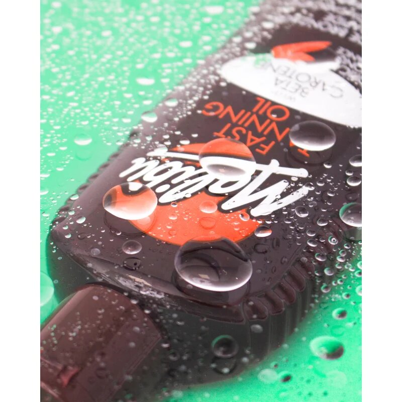 Malibu Fast Tanning Oil продукт за ускоряване и удължаване ефекта на загар 200 мл.