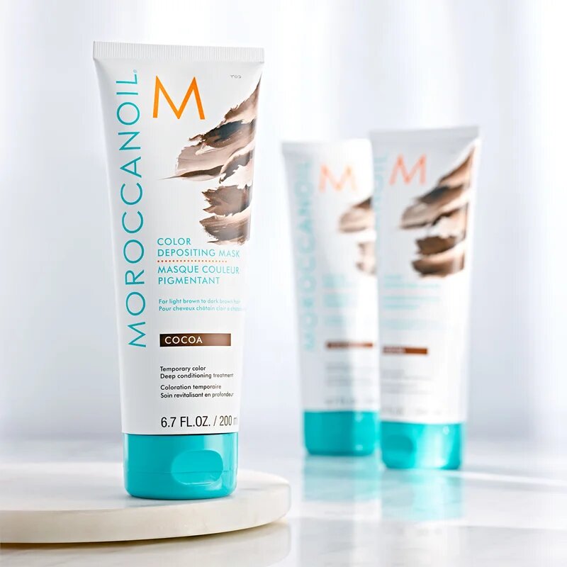 Moroccanoil Color Depositing нежна подхранваща маска без перманентни цветови пигменти Cocoa 200 мл.