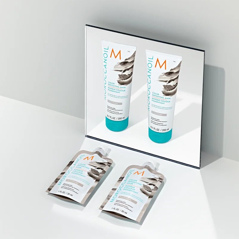 Moroccanoil Color Depositing нежна подхранваща маска без перманентни цветови пигменти Platinum 30 мл.