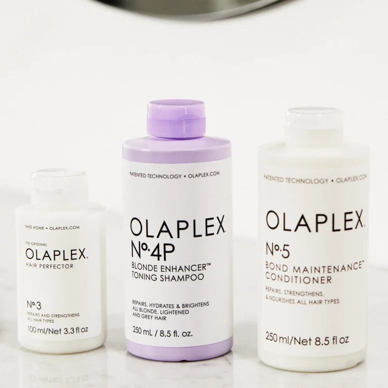 Olaplex N°4P Blond Enhancer Toning Shampoo лилав тониращ шампоан неутрализиращ жълтеникавите оттенъци 250 мл.