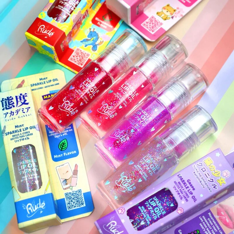 Rude Cosmetics Manga Collection Sparkle Lip Oil тониращо олио за устни с хидратиращ ефект цвят Mint 4 гр.