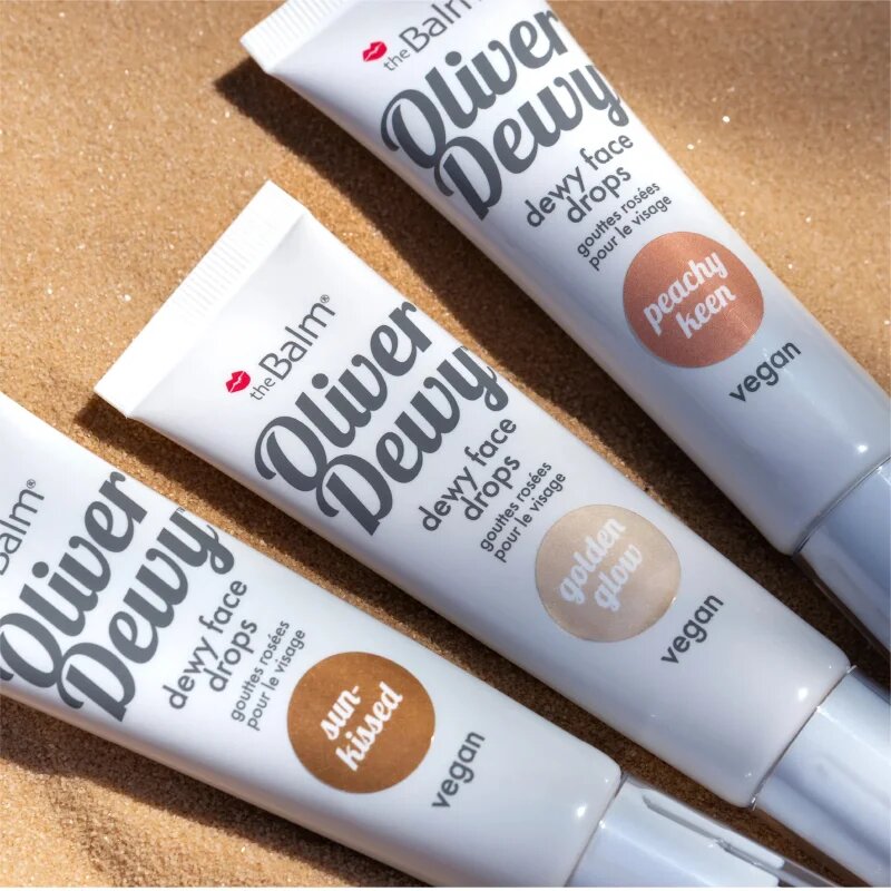 theBalm Oliver Dewy Face Drops течен хайлайтър цвят Golden Glow 28 мл.
