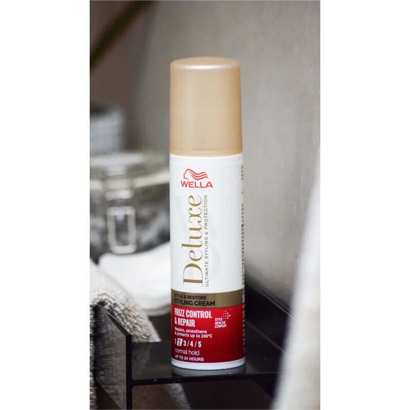 Wella Deluxe Style & Restore стилизиращ крем за изглаждане и възстановяване на увредена коса 100 мл.